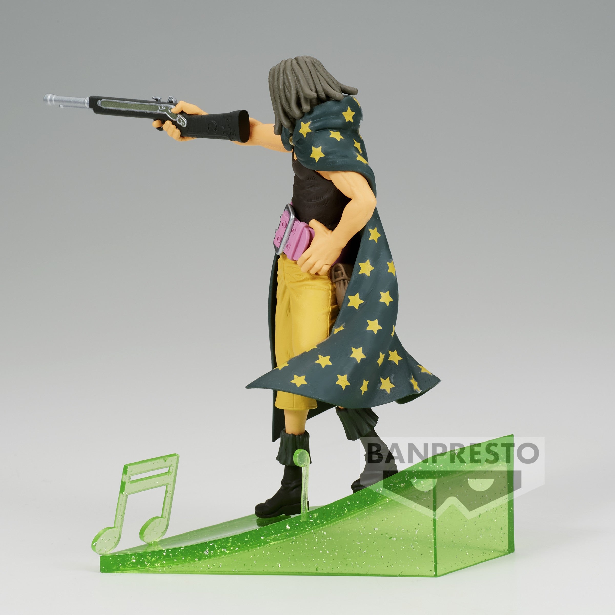 Figurine de Yasopp, tireur d'élite de One Piece, mesurant 12 cm, dans une pose dynamique avec une arme à la main, reposant sur une note de musique.