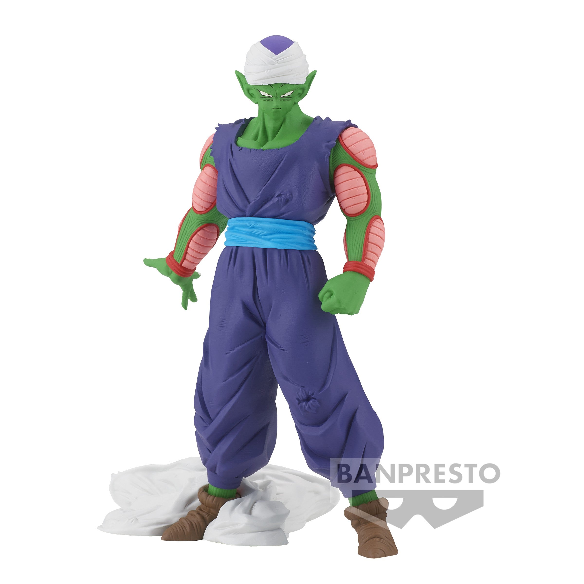 Figurine de Piccolo avec une tenue violette, tenant sa main en avant, cape au sol, exprimant la force et la détermination.