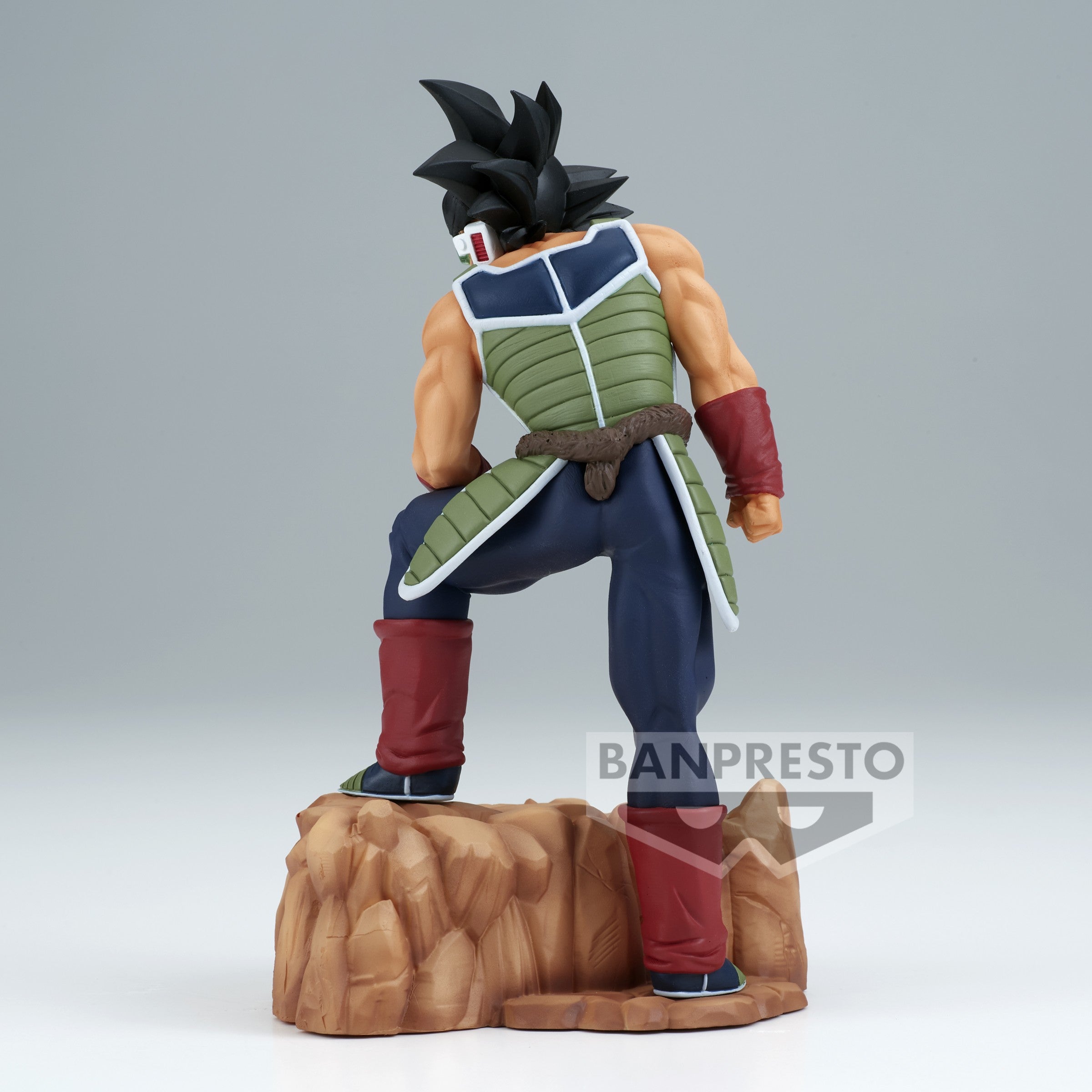 Figurine de Bardock en armure noire et verte sans épaulettes, portant un scouter vert, représentant un Saiyan de la collection History Box.