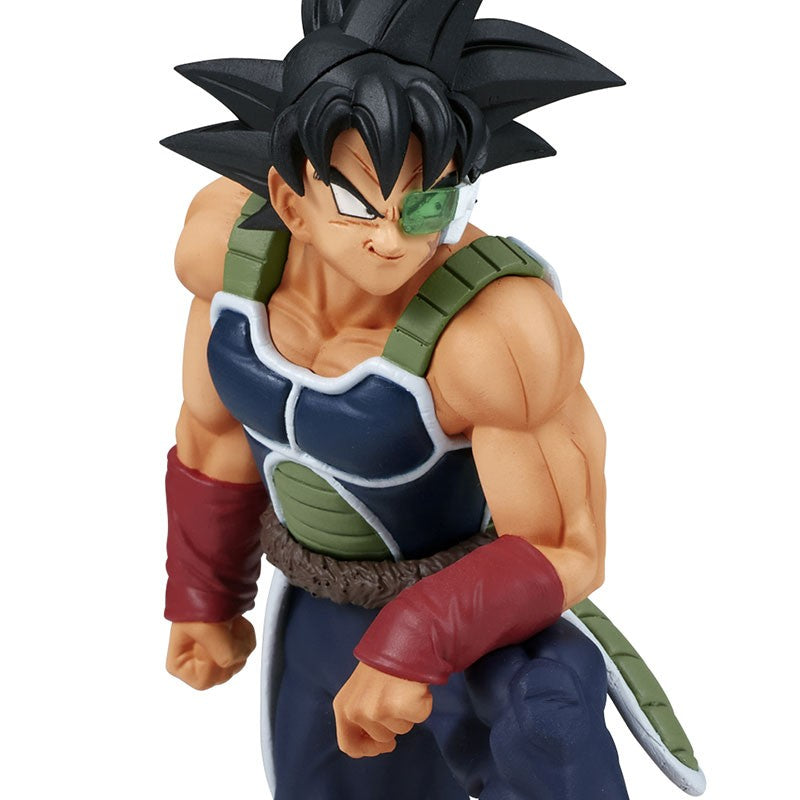 Figurine de Bardock en armure noire et verte sans épaulettes, portant un scouter vert, représentant un Saiyan de la collection History Box.