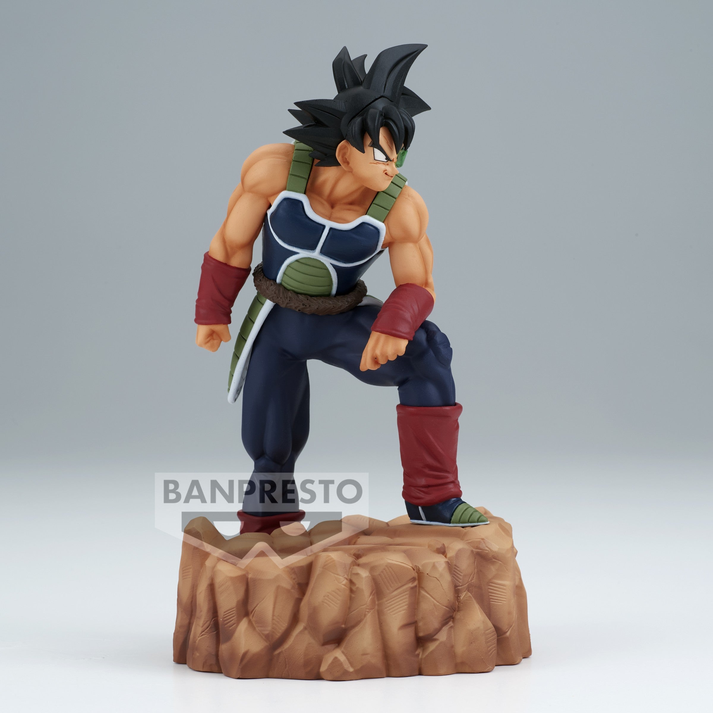 Figurine de Bardock en armure noire et verte sans épaulettes, portant un scouter vert, représentant un Saiyan de la collection History Box.