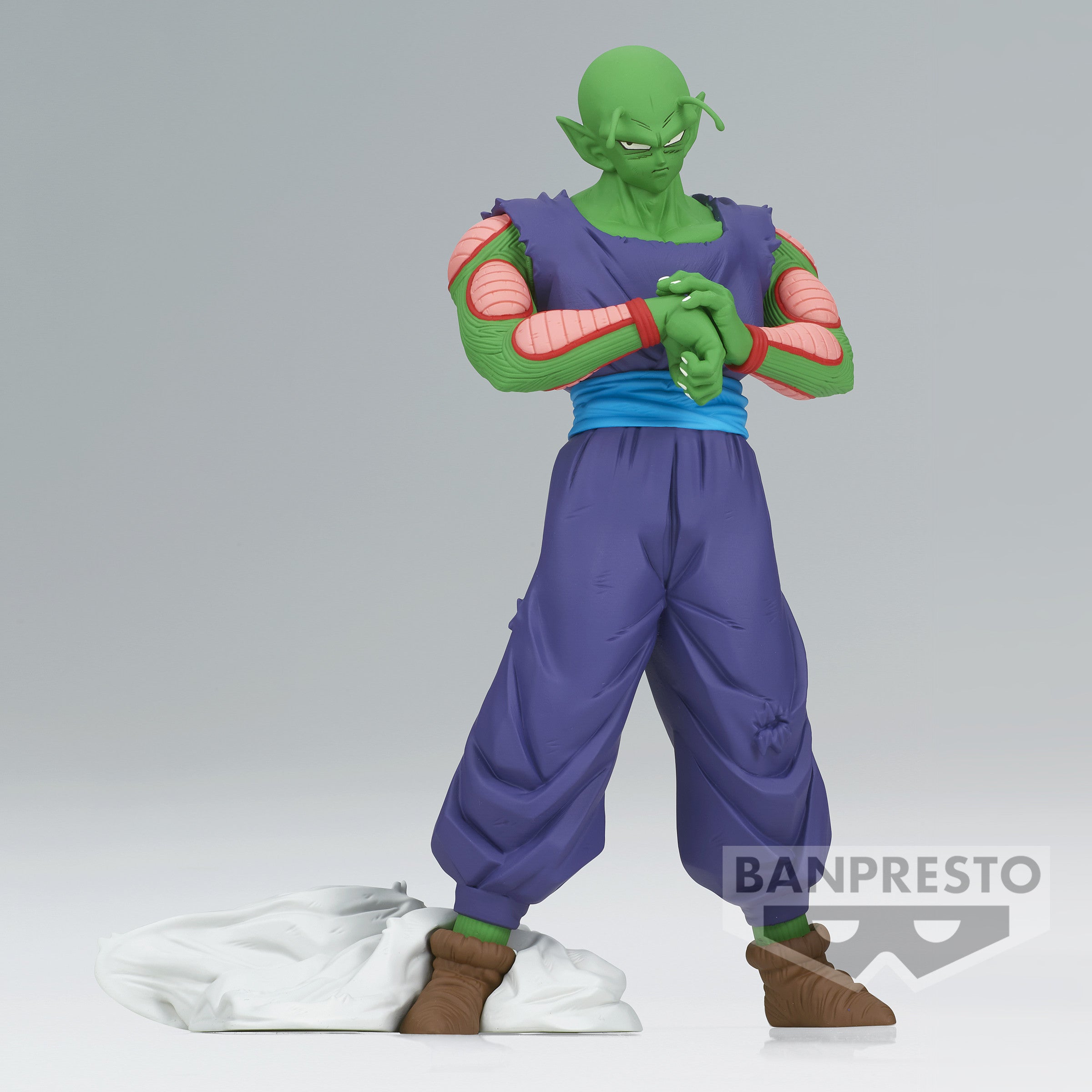 Figurine de Piccolo avec sa tenue iconique violette, montrant une posture déterminée sans sa cape, fabriquée par Banpresto.