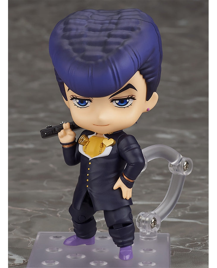 Vue 3/4 de face à mi-distance de la figurine Nendoroid de Josuke Higashikata de JoJo's Bizarre Adventure, avec petit sourire.