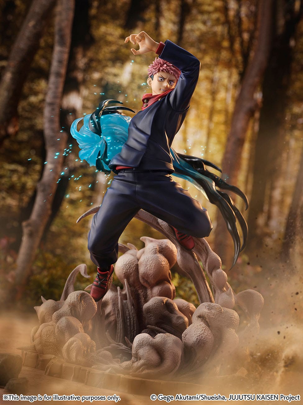 Figurine Funko Pop! de Yuji Itadori de la série Jujutsu Kaisen en uniforme bleu foncé, en posture dynamique avec expression intense, manipulant une énergie bleue tourbillonnante dans sa main gauche. Vue de face à mi-distance.