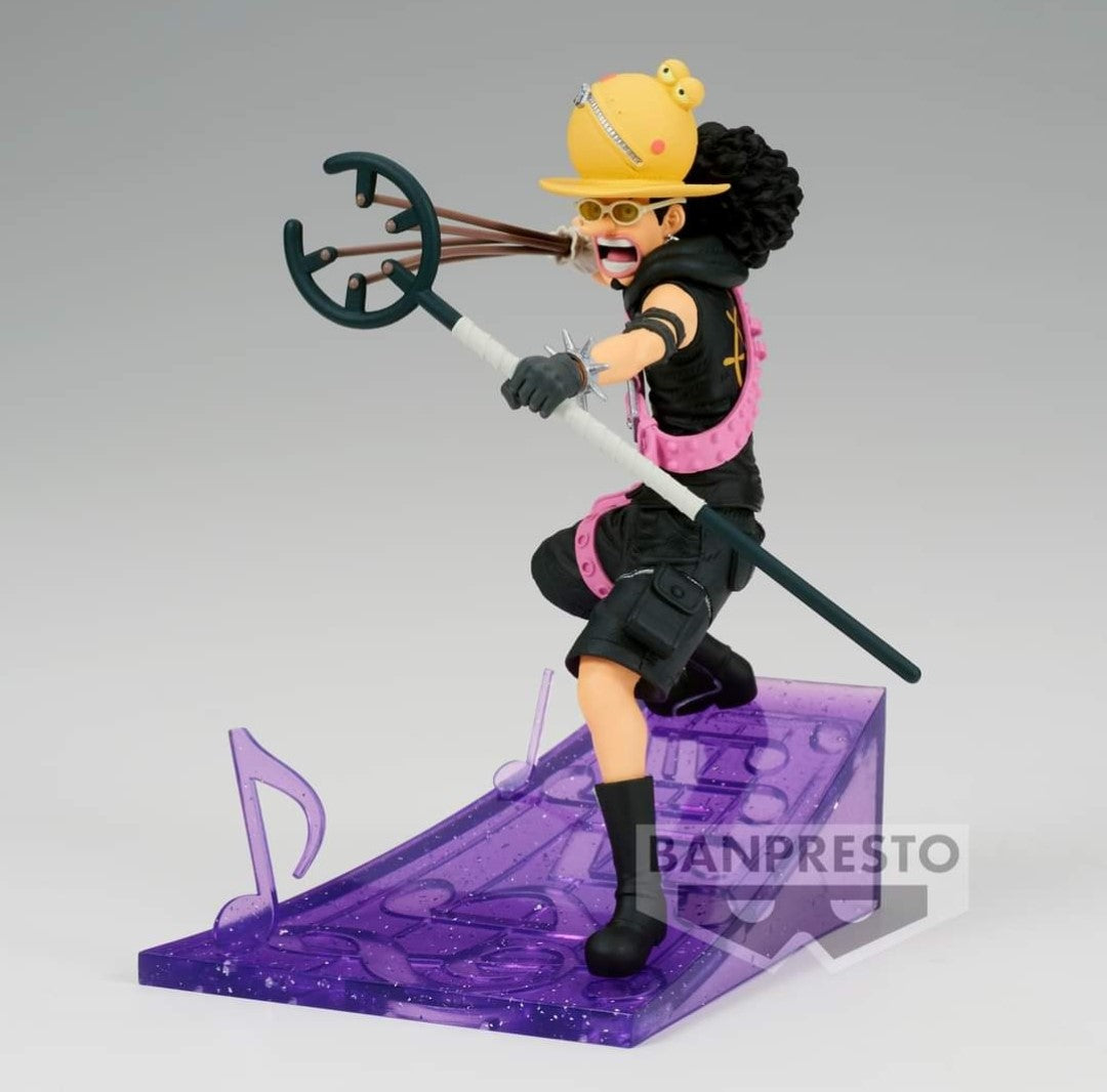 Figurine d'Usopp dans une posture dynamique, avec un socle orné de notes de musique, fabriquée en PVC par Banpresto.