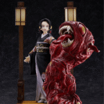 Vue 3/4 à mi-distance de la figurine de Kanao Tsuyuri de Demon Slayer en kimono noir avec motifs floraux, expression surprise.