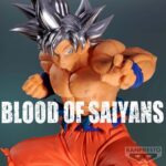 Figurine de Goku en transformation Ultra Instinct, avec des cheveux argentés et une expression déterminée, réalisée par Banpresto.