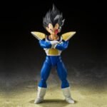 Figurine de Vegeta de Dragon Ball Z, mesurant 14 cm, avec trois visages interchangeables représentant différentes émotions, portant un scouter amovible et accompagné d'accessoires.