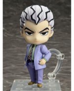 Vue 3/4 de face à mi-distance de la figurine de Yoshikage Kira de JoJo's Bizarre Adventure en costume lavande, avec un socle transparent.