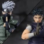 Figurine articulée d'Obito avec des détails précis, posant de manière dynamique avec un éventail.