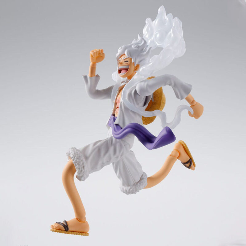 Figurine articulée de Monkey D Luffy en Gear 5 mesurant 15 cm, avec visage optionnel, quatre expressions faciales, trois paires de mains et bras étendus, représentant une scène dynamique de combat.