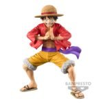 Figurine de Monkey D. Luffy en PVC, mesurant 21 cm, avec une posture dynamique, chapeau de paille et poing levé, représentant le personnage de la série One Piece, fabriquée par Banpresto.