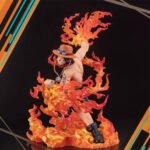 one-piece-figurine-portgas-d-ace-bouty-rush-5th-anniversary-extra-battle-figuarts-zero_1 Figurine de Portgas D. Ace de 17 cm, représentant le personnage entouré de flammes, avec des détails saisissants et une pose dynamique, fabriquée par Tamashii Nations.