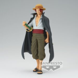 Figurine de Shanks le Roux avec des cheveux flamboyants et un regard déterminé, dans une pose dynamique, fabriquée par BANPRESTO.