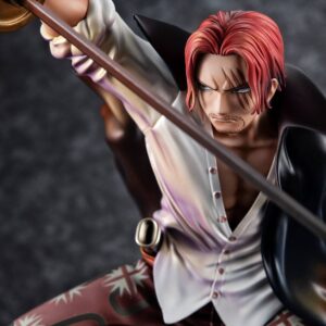 Figurine de Shanks le Roux dans une pose dynamique bloquant un coup de poing, avec des détails précis sur le visage et les vêtements, fabriquée en PVC par MEGAHOUSE.