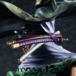 Figurine de Roronoa Zoro dans sa version Zoro Juro, représentant le personnage avec une pose dynamique, fabriquée en PVC par MEGAHOUSE, montrant des détails soignés et une finition de qualité.